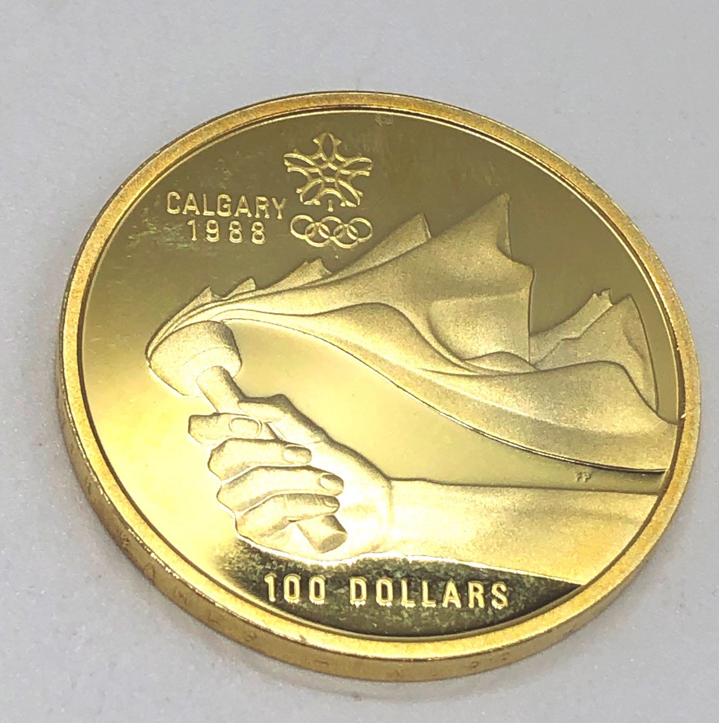 カンガリーオリンピック100ドル金貨